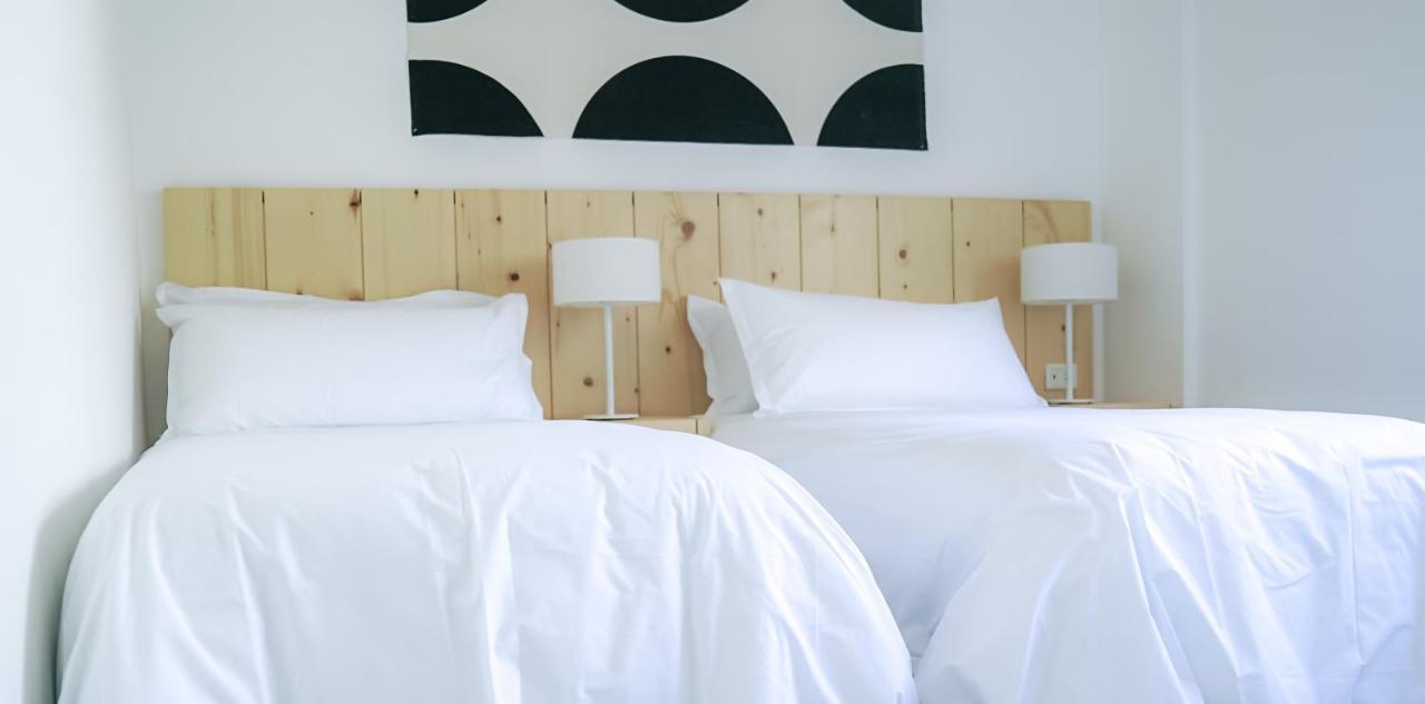 Casagrande Hotel & Beach Club Хосе-Игнасио Экстерьер фото A bed with white sheets