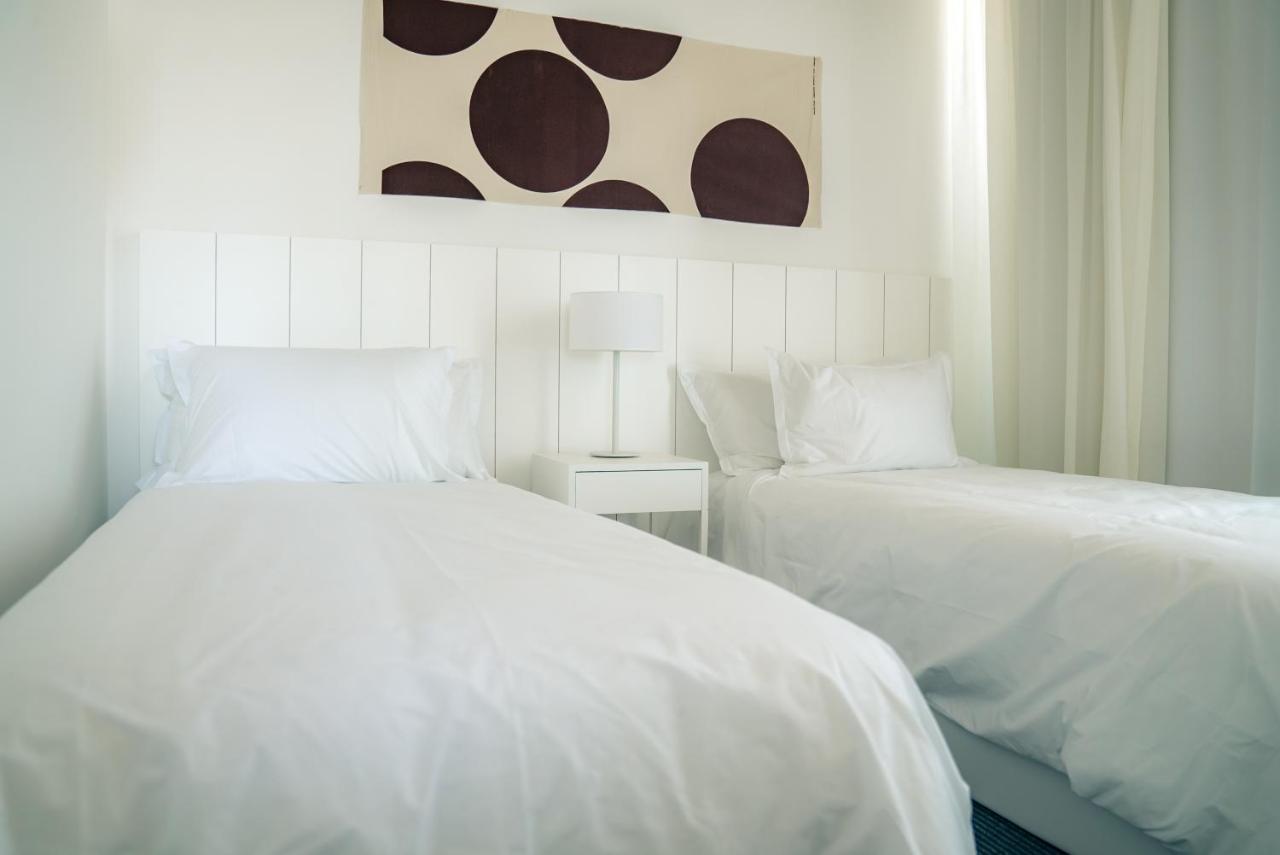 Casagrande Hotel & Beach Club Хосе-Игнасио Экстерьер фото A bedroom with two single beds